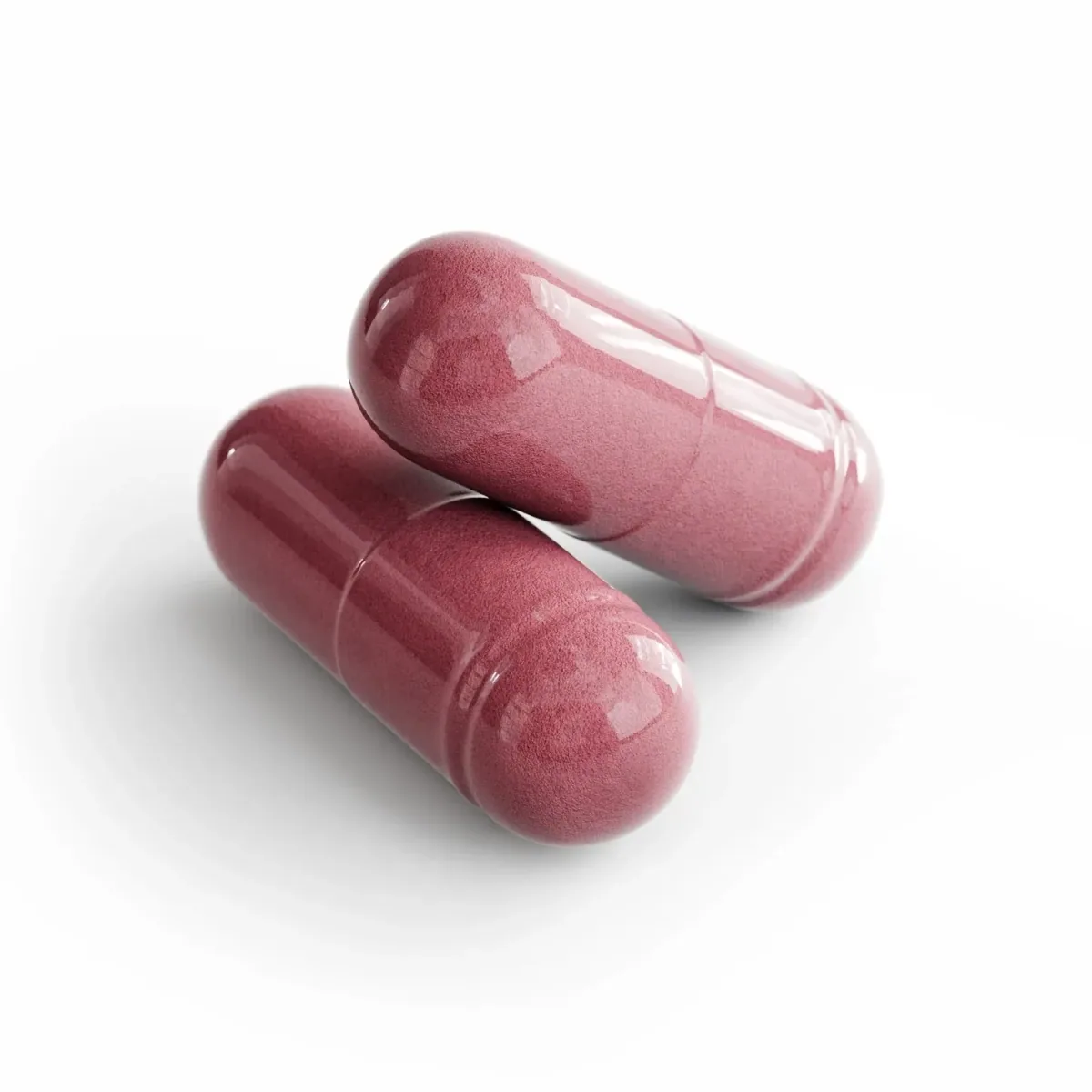 Two deep-red beetroot capsules